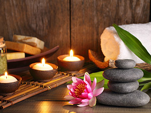 Candles, towels, stones and a variety of other massage accessories